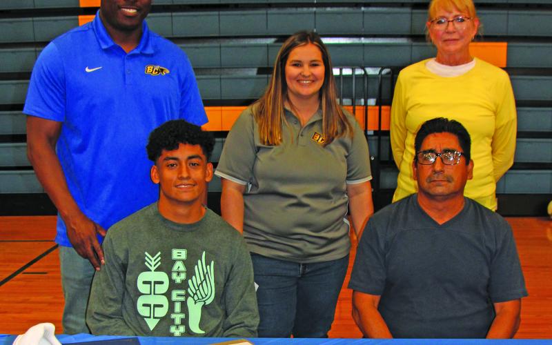 Sentinel photo/Mike Reddell Angel Campos signed a letter of commitment for track and field and cross country with Texas A&amp;M-Kingsville at ceremonies Thursday, May 18. He holds the BCHS record for 3200m and was cross country state qualifier and runner of the year (2021, 2022).