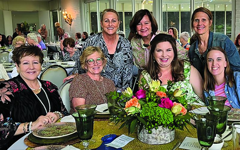 Photo by Karen Restivo Caroline Kunkle, center, poses with her first-place and “Design of Excellence” winning floral arrangement after the Floral Luncheon Club’s annual standard flower show in April. Other winners not pictured include Veronica Dibbern, Tricia Lewis, Sara Huebner, Karen Restivo and Cerie Muecke.