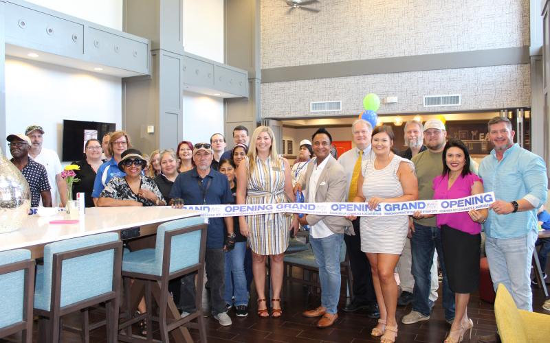Sentinel Photo/Jessica Shepard Hampton Inn &amp; Suites held its renovation open house and ribbon-cutting ceremony Thursday, May 18. Renovations include new guest rooms, meeting spaces, lounge area, and more. The hotel is located at 4617 7th St. in Bay City.