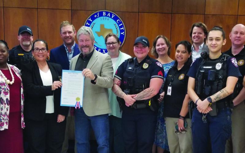 Sentinel Photo/Mike Reddell City Council recognized National Police Week (May 14-20) with a proclamation and a photo with Bay City Police at council’s May 9 meeting.