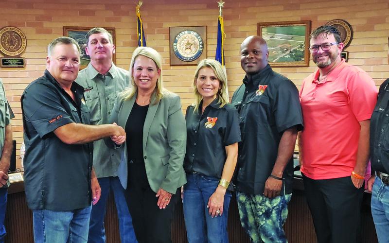 Sentinel Photo/Jessica Shepard Van Vleck ISD trustees unanimously approved hiring Christie Dement, center, as the new Superintendent of Schools during their regular meeting Monday night.