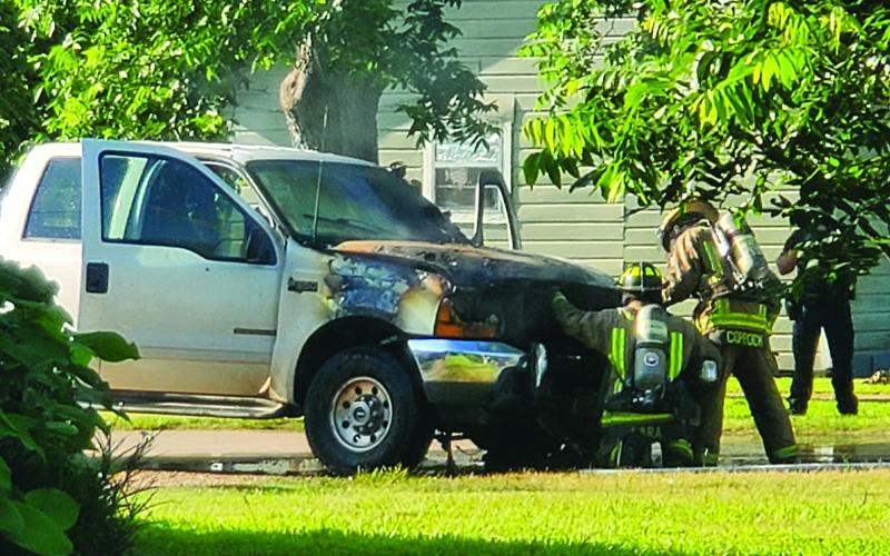 Sentinel photo/MaLinda Reddell Bay City firefighters extinguish a truck fire that Fire Marshal Dan Shook said was blamed on failing to complete a vehicle recall.