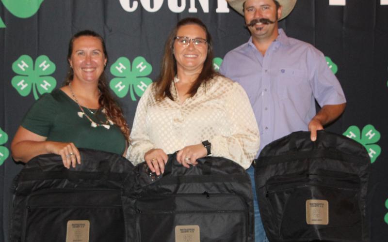 Sentinel Photo/Jessica Shepard “Outstanding 4-H Leader” awards went to Karen Botbyl and Dr. Audrey and Trace Jacoby