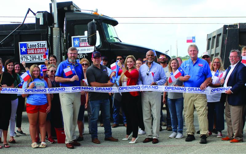 Sentinel Photo/Jessica Shepard Lone Star Sand &amp; Gravel partnered with the Bay City Chamber of Commerce &amp; Agriculture to celebrate its grand opening with a ribbon-cutting ceremony Monday morning at the Bay City Civic Center. Lone Star is a woman-owned business and features a team led by CEO Tammi Tinnin, CFO Trent Tinnin, and Sales Manager Jackie Calk.
