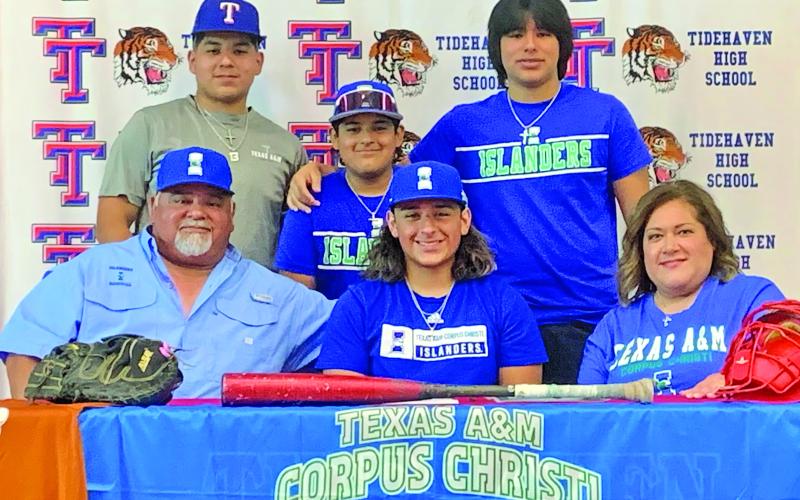 Le'Darion Stone photo Tidehaven’s varsity catcher, Zach Garcia’s signing day picture with his parents and brothers when he recently signed with Texas A&amp;M University Corpus Christi ,to further his education and play baseball.