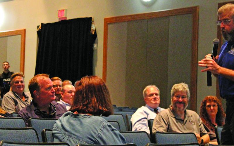 Sentinel Photo/Jessica Shepard Bay City ISD Superintendent Dr. Dwight McHazlett, right,  spoke to over 30 audience members about the district’s desire for more community partnerships and how the district was meeting its LSG goals last Thursday.
