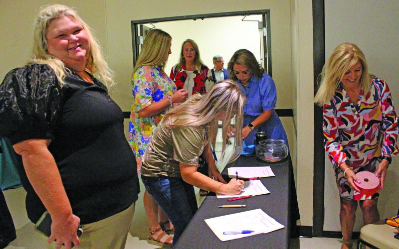 Sentinel Photo/Jessica Shepard Several new teachers check-in and got handed a door prize ticket as the Bay City Chamber of Commerce &amp; Agriculture hosted its 37th Annual "New Teacher Breakfast' last Friday, Aug. 11. New teachers from Bay City, Van Vleck, and Matagorda ISD showed up to be recognized and supported by local businesses and private individuals.
