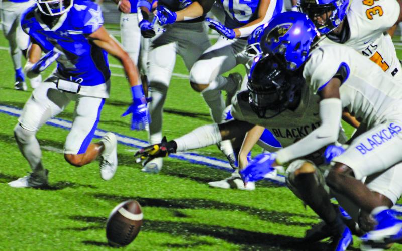 Sentinel Photo/Mike Reddell Blackcats scrambled - and recovered - an Edna fumble.