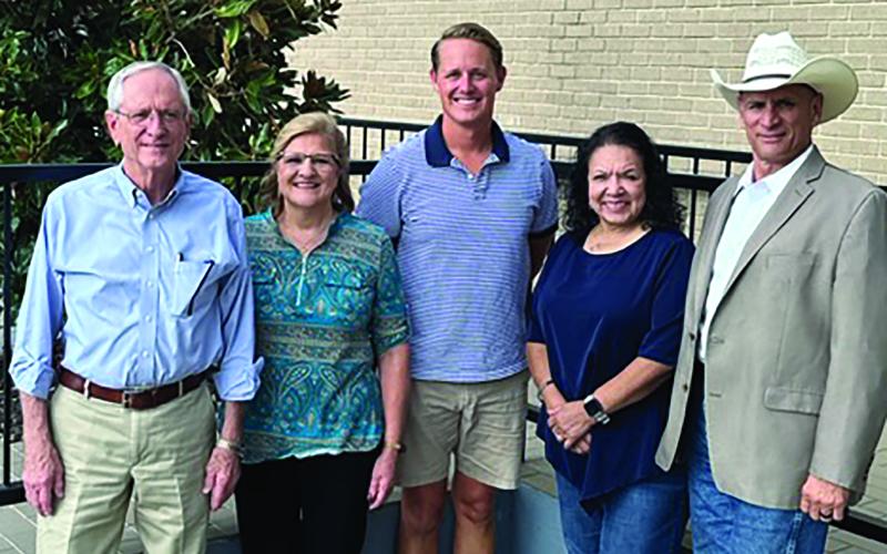 Contributed photo Bobby Wilkinson and Teri Cartwright (Bay City Abstract and Title Co.), Douglas Arlitt (Custom Auto Refinishers) and Sissy and Rick Deleon.