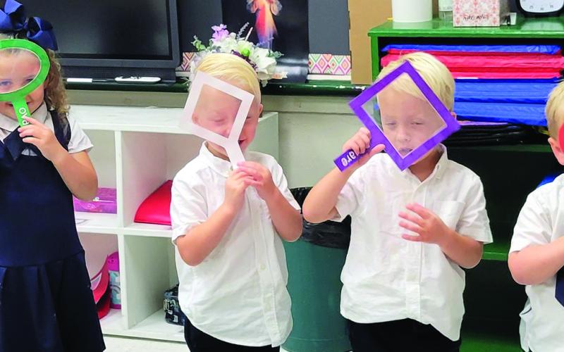 Holy Cross Catholic School Ms. Lacy's PreK–3 shape detectives at Holy Cross Catholic School went on a shape-hunt throughout the entire school! A couple of shapes were hard to find, but we found them all.