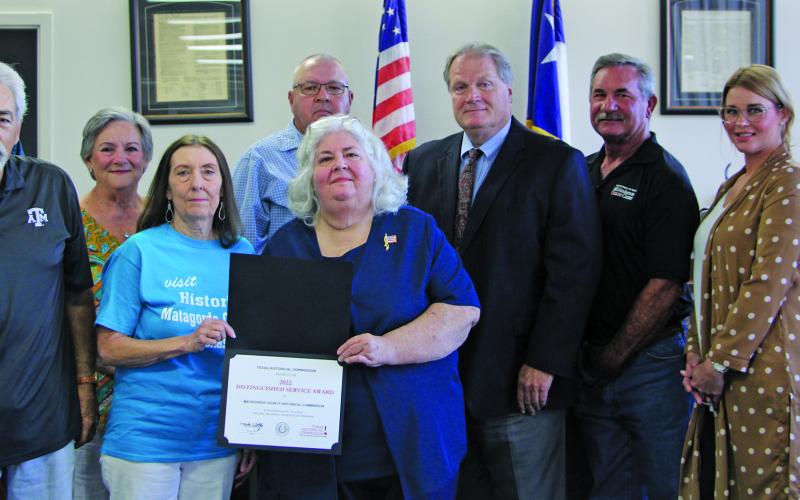 Photo/Crystal Morones Matagorda County Historical Commission members joined Commissioners Court as the county presented MCHC with the Texas Historical Commission Distinguished Service Award.
