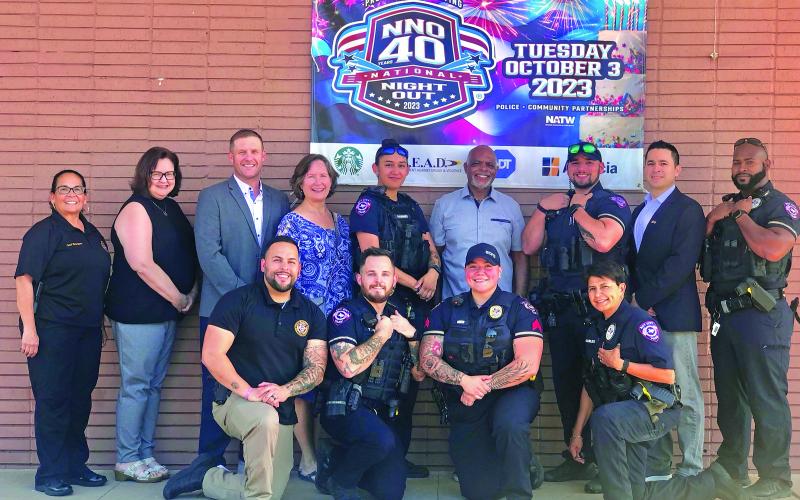 Contributed photo City Council and city officials join Bay City Police Department members in promoting National Night Out Tuesday, Oct. 3.