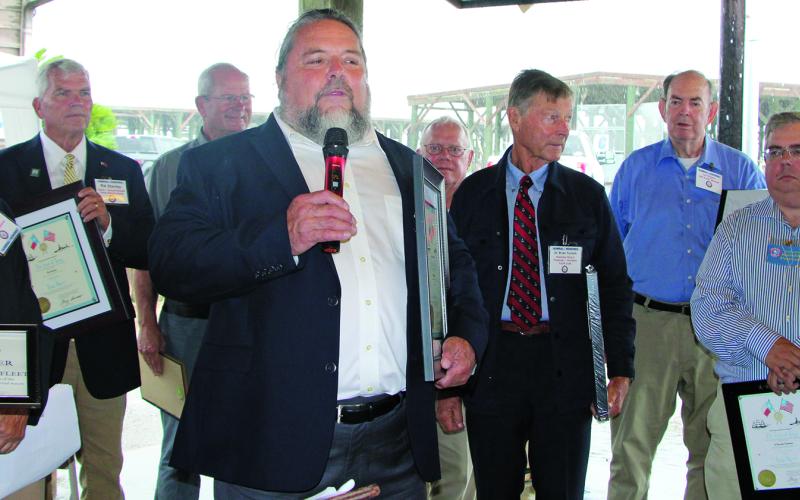 Sentinel Photo/Mike Reddell Newly commissioned Texas Navy Admiral Bill Balboa also was honored as the fleet’s Oyster Catcher and made remarks to explain the significance. He is joined by other new admirals at the Sept. 16 ceremony.