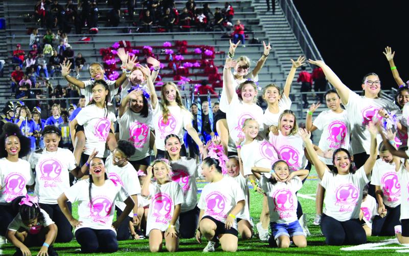 Halftime at the Bay City-El Campo game featured the Aristocats and the Little Aristocat Campers in a routine that ended with a group flourish. Bay City won the longtime rivalry game. See Sports, Page 6, for game details. Sentinel photo/Mike Reddell