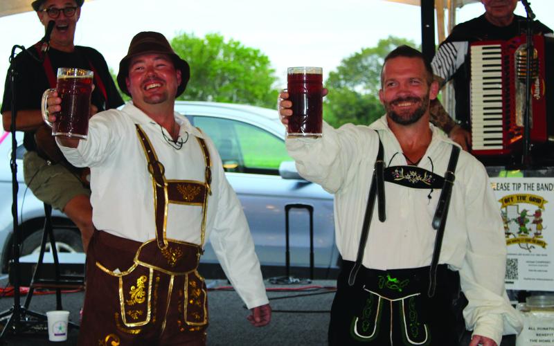 Sentinel photo/Jessica Shepard A "Stein Hoisting" contest helped kick off the Matagorda Regional Medical Center Foundation's "Pulse" fundraiser last Saturday. Of five competitors, only Taylor Ashcraft and James King were left to face off head-to-head - King took first place and Ashcraft earned second.