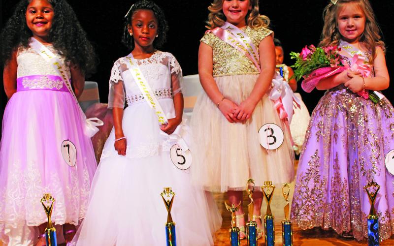 Sentinel Photo/Jessica Shepard Harper Garcia, far right, was crowned as the 2023 Little Miss Rice Festival on Saturday, Oct. 14. Her court features, left-to-right, 3rd runner-up Haven Wendel, 2nd runner-up Paris Andrews, and 1st runner-up Ellie Hutto