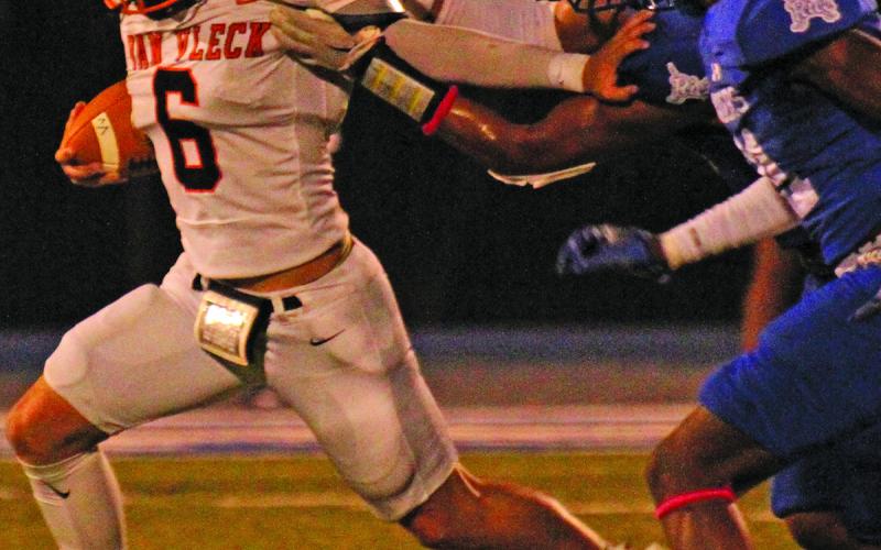 Anna Hernandez photo Lep running back Brett Noster (6) stiff arms a Rice defender.