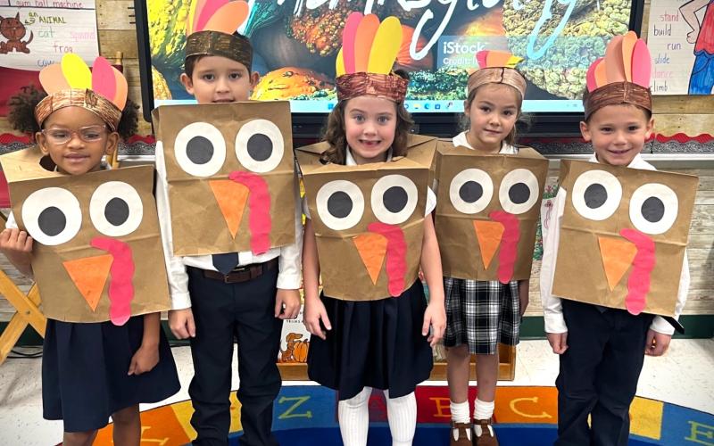 Contributed photo Holy Cross Catholic School's first grade class performed two plays, sang a song, and shared videos about what they’re thankful for.