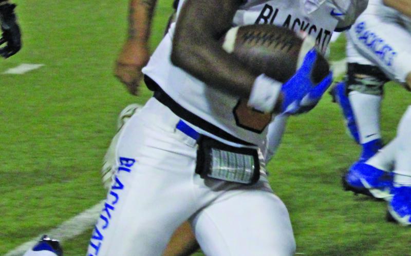 Sentinel Photo/Mike Reddell Junior running back Jada Andrews (8) finds some running room.