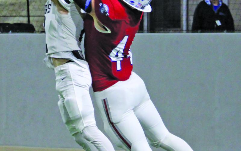 Sentinel Photo/Mike Reddell While a Rogers defensive back had plans for an endzone interception, Justin Griffith (44) made sure that didn’t happen as he reached high and plucked the ball away and came down with a Tidehaven touchdown.