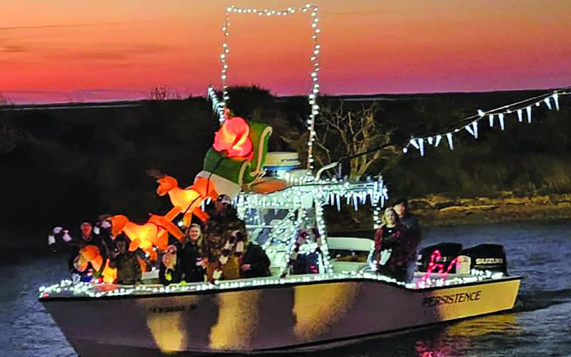 The  Matagorda Christmas Lighted Boat Parade looped around Matagorda Harbor a couple of times on Friday, Nov. 24.