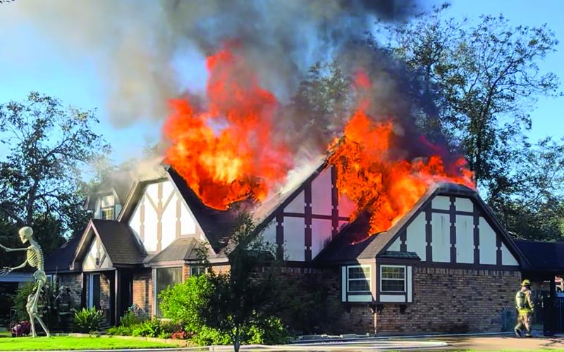 Contributed photo Flames engulf a Shadow Lane house Nov. 15 that caused $400,000 in damages. The family wasn’t home.