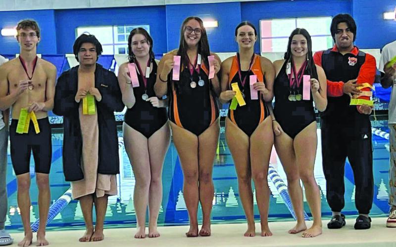 VVISD photo     The Van Vleck Swim Team competed  at the Victoria Invitational Nov. 11. Nicole R secured a Gold medal in the 100 yard breaststroke. Nicole and Curtis G. won bronze in 200 yard individual medley (IM). Grace G. won bronze for her race in the 100 yard butterfly. Girls 400 free relay worked hard for the silver medal. All of those top 3 finishes were accompanied by many other 4-8 finishes.