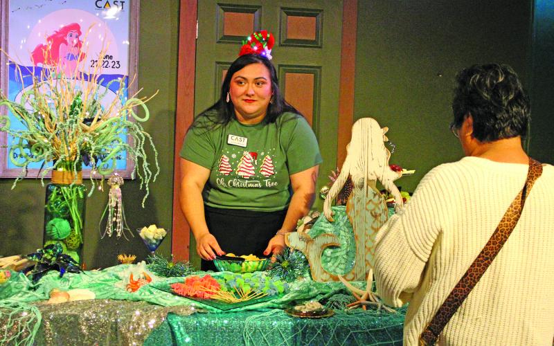 Sentinel Photo/Jessica Shepard Community Actors of South Texas (CAST) Board Member Victoia Mitchell explained what to expect for "The Little Mermaid Jr." as part of CAST's summer student workshop program next year during CAST's annual "Premiere" event last week. The 2024 production season includes several musicals, comedies, and a murder mystery showcase.