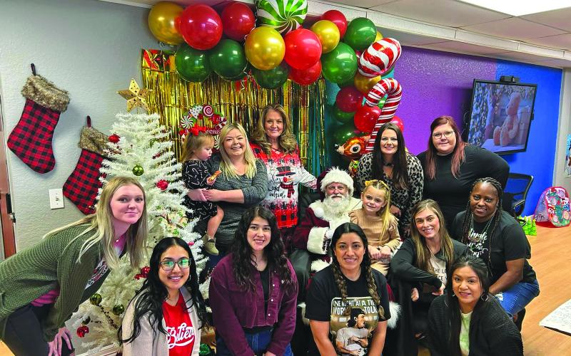 Contributed photo The Crisis Center folks say they consider their resident Christmas party as one of their favorite Christmas traditions - games, presents, food, fun and most importantly Santa.