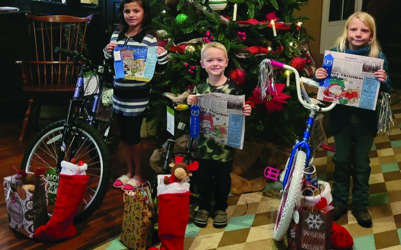 Sentinel Photos/MaLinda Reddell Congratulations to this year's Christmas Coloring contest winners. From left to right are: Alaina Chavez - 9-12 age group; Trevor Bloom, 2-4 age group; and Hannah Hickl 5 - 8 age group.