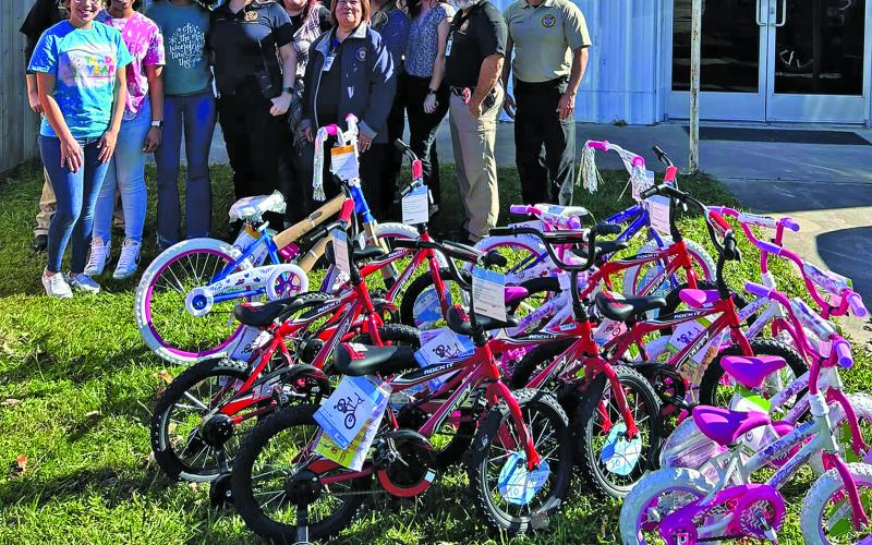 Contributed photo Tender Years Enrichment Center donated bicycles to the PD. The PD donated the bicycles to The Crisis Center. Thank you to everyone involved to make this happen. Featured in pic: Tender Year Enrichment Center employees; Symirra James, Arieanna Selman, Karla Frausto, PD staff and Crisis center employees.