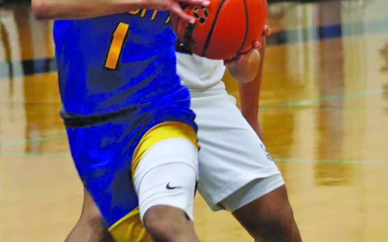 LeDarion Stone/Live in the Moment Photography Above Blackcat Alex Estrada (1) prepares for a layup against Sweeny Jan. 5. Bay City, 4-12,-0-3, fell to the Bulldogs there 59-57 in overtime. Next up for the Blackcats will be LaMarque here Friday, Jan. 12.