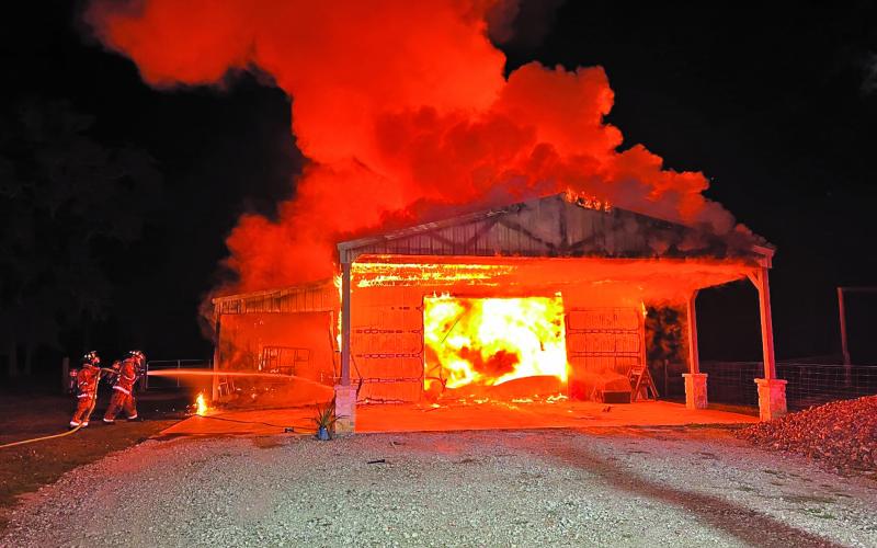 Fire Marshal Dan Shook Firefighters battle a barn fire caused by fireworks on New Year’s Eve near Van Vleck.