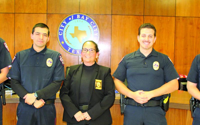 Sentinel Photo/Jessica Shepard At promotion ceremonies last week three new officers were sworn in and Sergeant Chris Hadash was pomoted to lieutenant. From left: Cody Janssen, Ryan Saucedo, Chief Christella Rodriguez, Braeden Fojtik and Hadash.