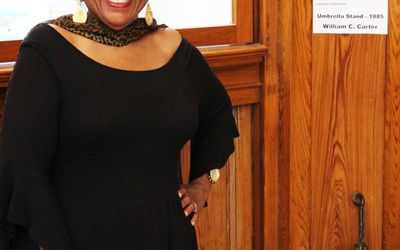 Donnye Stone, above, stands at the entrance of her annual "Black History Month" exhibit at the Matagorda County Museum. Stone's exhibit is on display in the museum's lobby until Wednesday, Feb. 28.