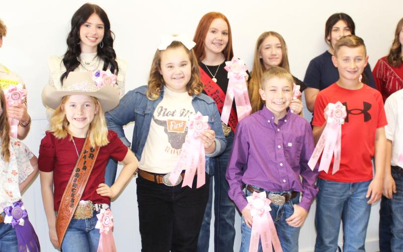 Sentinel Photo/Jessica Shepard Matagorda County Fair and Livestock Association's home economics food division reserve grand champions earned pink rosettes for winning their chosen divisions Saturday, Feb. 24. Winners include Gideon Straug, Emily Boehm, Meredith Jones, Jase Alford, Jeret Girndt, Lyra Saha, Ryleigh Siptak, Marley Kennedy, Anthony Pulvino, Alissya Krause, Ellie Curtner, Caden Baker, Landon Davis, Madelyne Wollam, Jack Bonnot, Makayla Alford and Savannah Remmy.