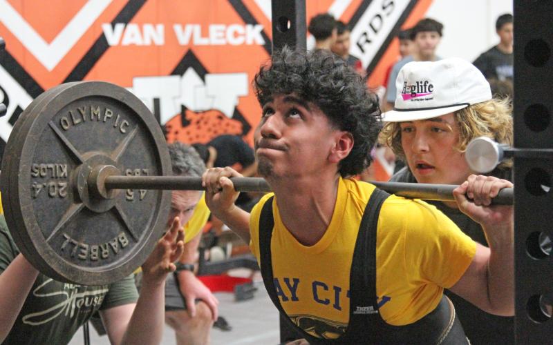 Photos by Anna Hernandez Senior Bay City powerlifter Yahir Amezquita strains at the Van Vleck powerlifting meet Feb. 8.