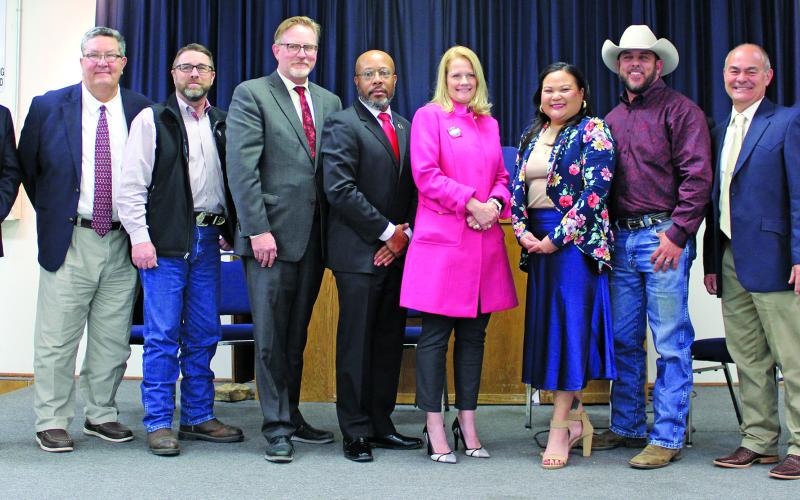 Sentinel Photo/Jessica Shepard Nine March 5 Primary Election candidates graced the stage at VFW Post #2438 to answer audience questions on Thursday, Feb. 15. From left are Rick DeLeon, John Maher, Bill Orton, Matthew Sloan, forum moderator Vince Bryant, Colleen Manske, Jennifer Chau, Philip Hester, Ricky Bort and Aaron Green.