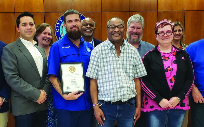 Sentinel Photo/Jessica Shepard The City of Bay City Recycling Center was recently recognized by 'Keep Texas Beautiful' for their outstanding recycling efforts in 2023 and posed with their award at city council last Tuesday.