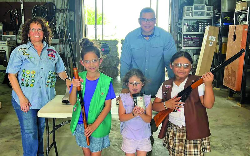 Contributed photo Police Chief Christella Rodriguez and her husband Reserve Officer Jesse Rodriguez offered a gun safety course for Bay City Girl Scout Troop 156096. Rodriguez said it was such an honor help the girls learn gun safety.