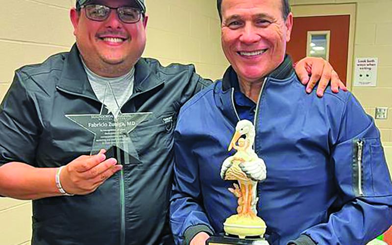 The MRMC Medical Staff recently honored Dr. Fabricio Zuniga and Dr. Gregory Pappas at their quarterly meeting. Zuniga was recognized for going above and beyond to help a nurse get a patient transferred to a higher level of care and Pappas was honored for his 5,000th delivery. Contributed photo