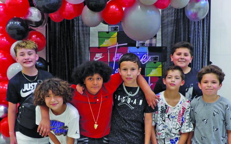 Contributed photo Tenie Holmes Elementary kids pose for a photo at the recent Sneaker Ball.