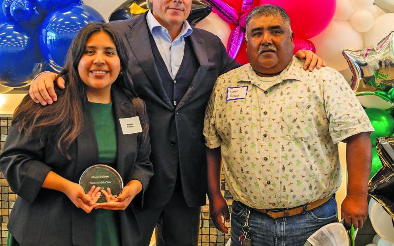 Tenaris photo Tenaris US President Luca Zanotti, center, with Student of the Year winner Abigail Padron and her father, Nereo Padron.