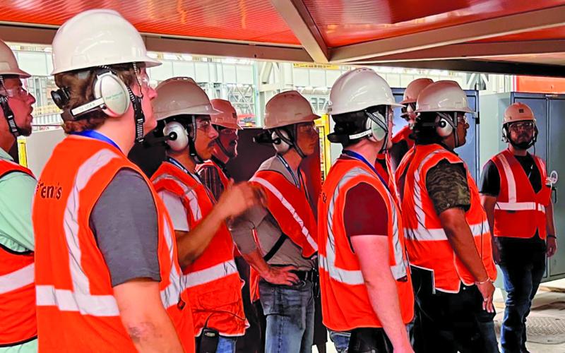 Tenaris Photo Cristian Sanchez leads a Wharton County Junior College student visit to the plant in 2023 when he, too, was a student.