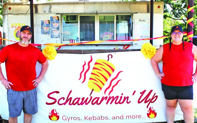 Sentinel Photo/Jessica Shepard Josh and Zanna Aaron were all smiles for their "Schawarmin' Up" grand opening on Saturday, June 8.