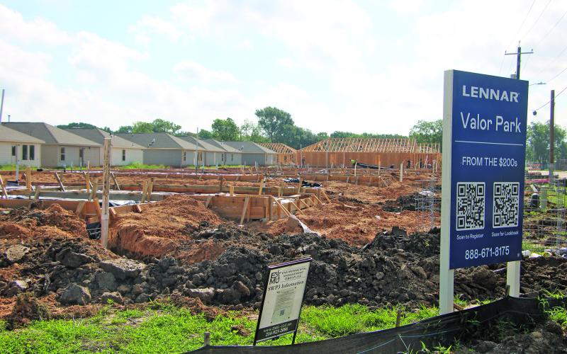 Sentinel Photo/Mike Reddell Houses are going up at Valor Park off 16th Street. BCCDC Executive Director Jessical Russell said about 20 residences are up, plus several foundations.