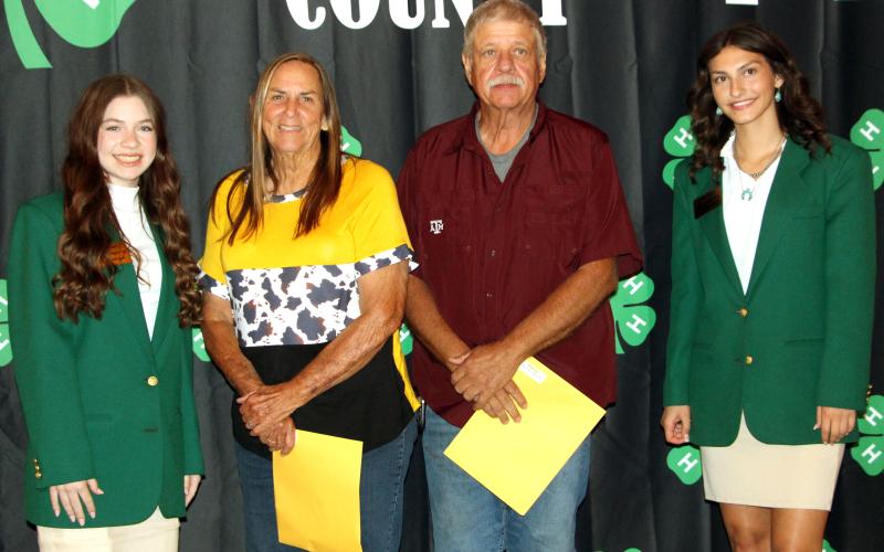 Sentinel Photo/Jessica Shepard Matagorda County 4-H Adult Leadership Award winners were Patty Frankson and Mark Page with 30 years of service flanked by 4-H Ambassadors Scollie Saha and Kaitlyn Gilbert. Not pictured are 5-year award winners Nicole Dodd, Tiffany Oncken, and Desiree Spears.
