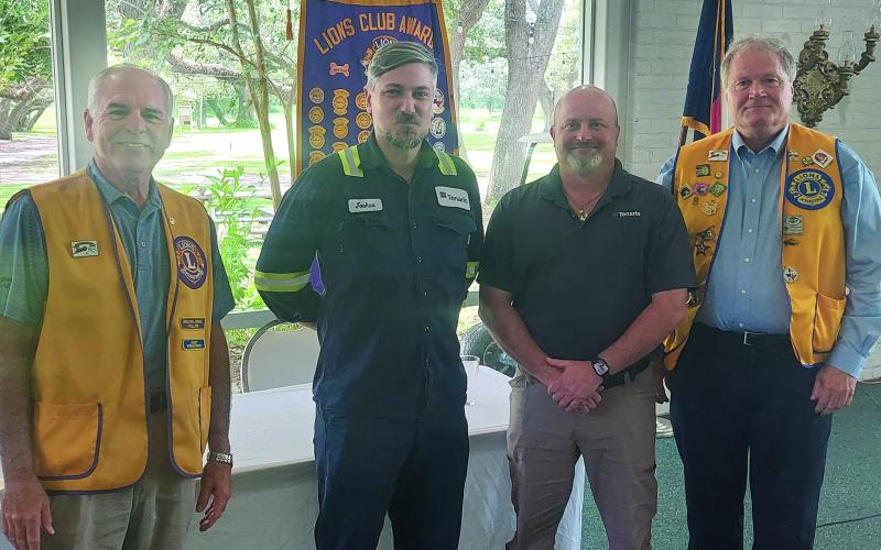 Contributed photo Josh Hardin is a new member of Bay City Lions. Shown, from left are: Mitch Thames, Hardin, his sponsor John Miller and president Bobby Seiferman.
