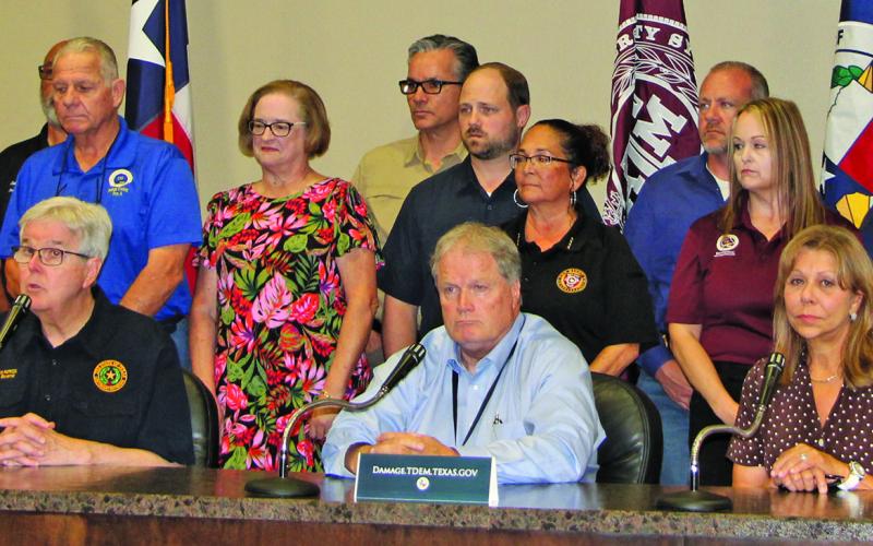 Acting Governor Dan Patrick, County Judge Bobby Seiferman, State Senator Joan Huffman, and Texas Department of Emergency Management (TDEM) chief W. Nim Kidd take part in Beryl news conference at the CED Wednesday, July 10..