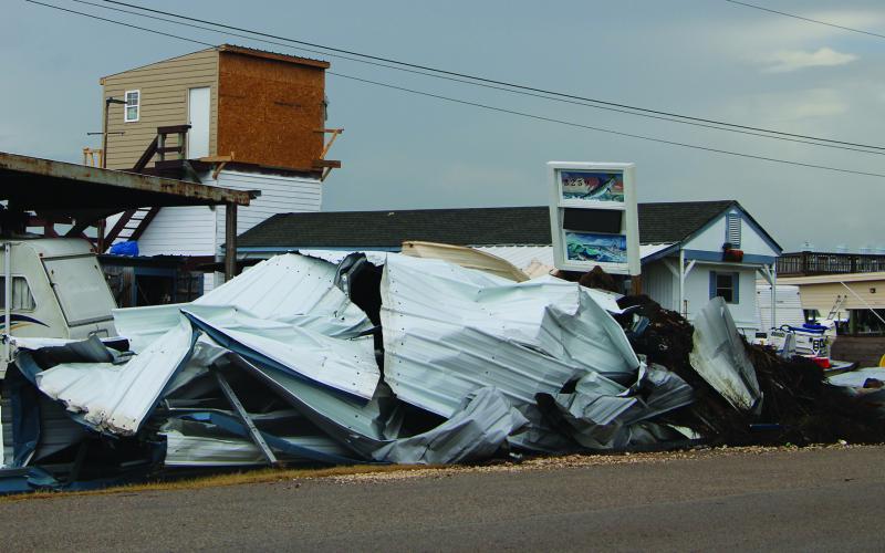 Sentinel Photo/Mike Reddell Hurricane Beryl left a trail of twisted metal in its wake.